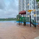 Homey And Cozy Living Studio Amartha View Apartment By Travelio