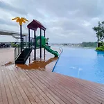 Homey And Cozy Living Studio Amartha View Apartment By Travelio