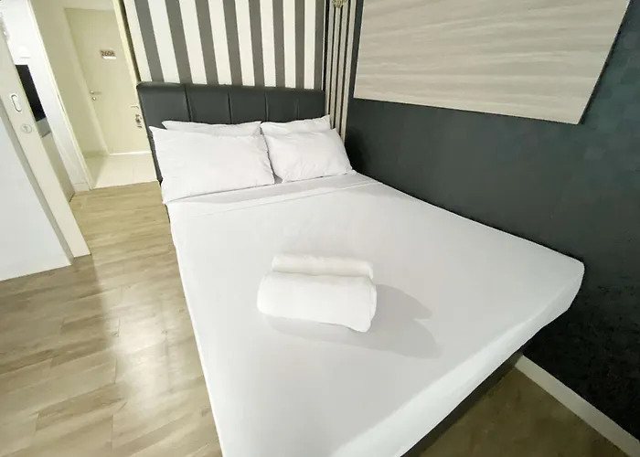Homey And Cozy Living Studio Amartha View Apartment By Travelio